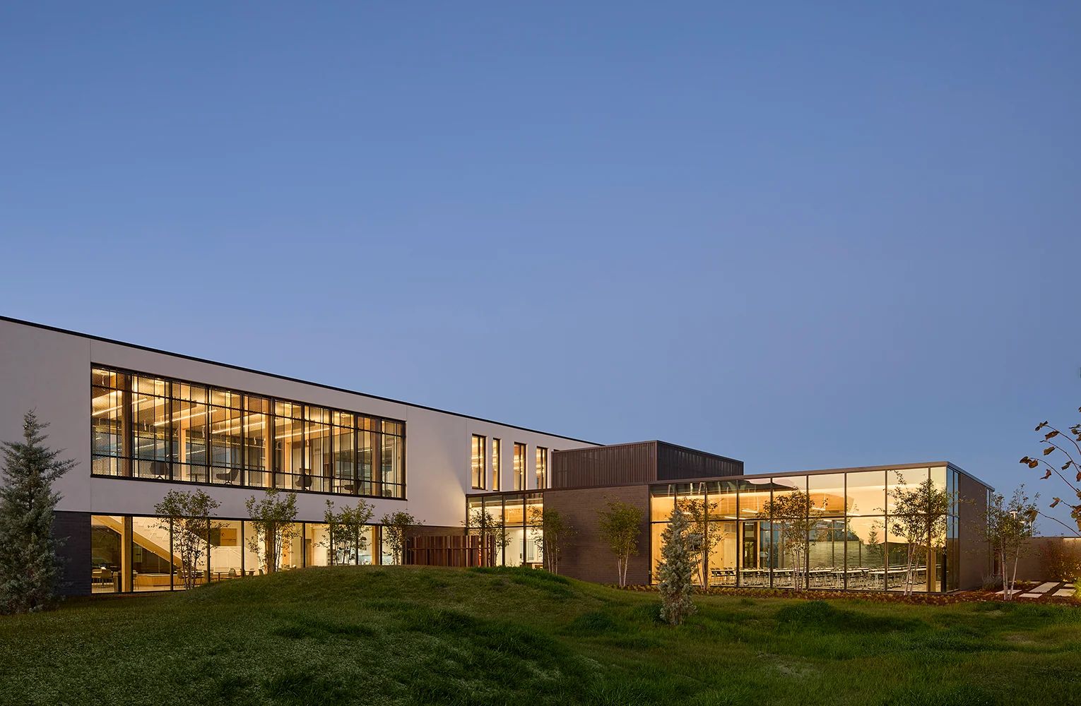 Institutional building exterior at dusk